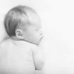 black and white portrait of a sleeping newborn by Laura Mares Photography, Pittsburgh Newborn Photographer.