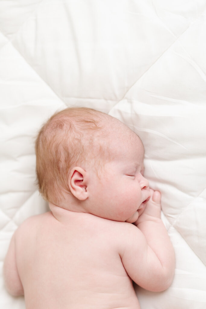 natural newborn portrait in modern white studio