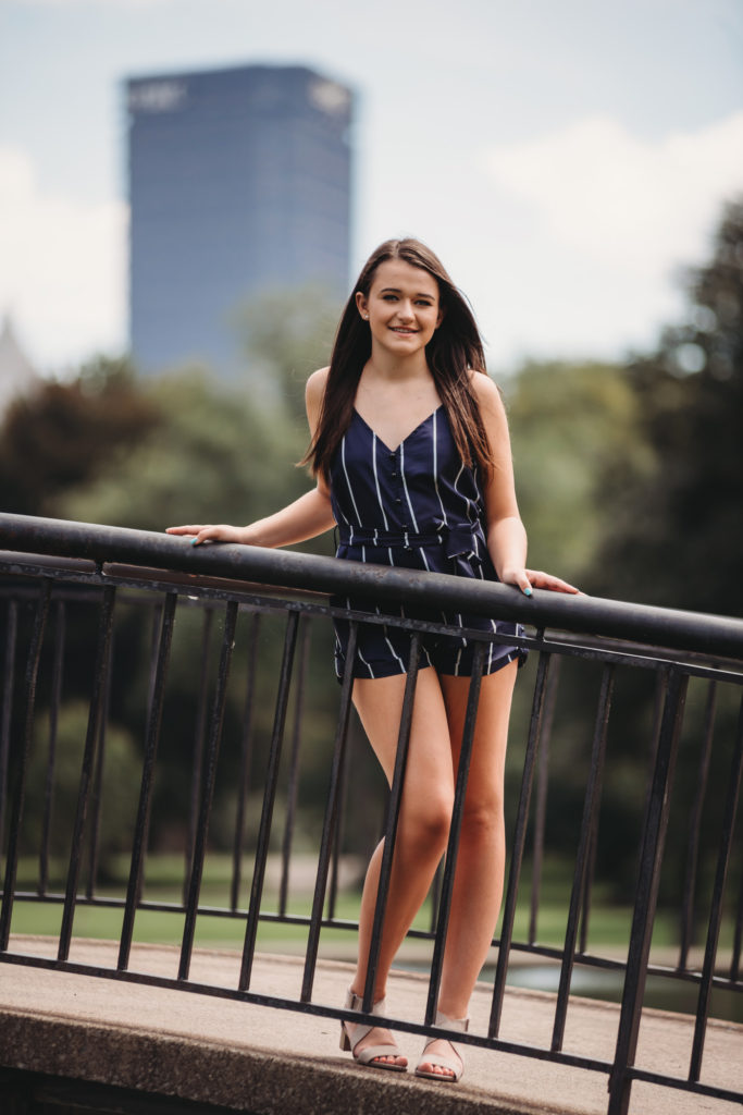 Senior Pictures of a beautiful girl standing on a bridge in the North Side, Pittsburgh