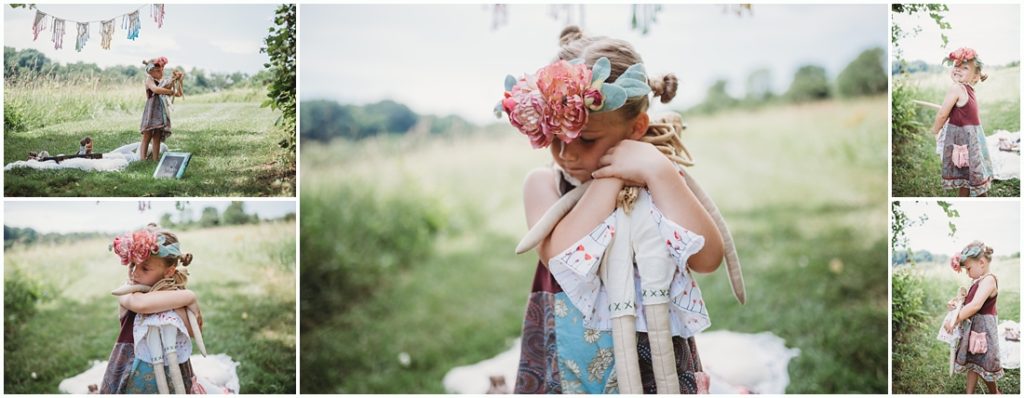 Ella playing with her favorite doll named Tutu. Photo by Laura Mares, a Pittsburgh Child Photographer.