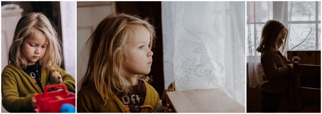 A girl looking out a window. Photo by Laura Mares, Pittsburgh Lifestyle Photographer