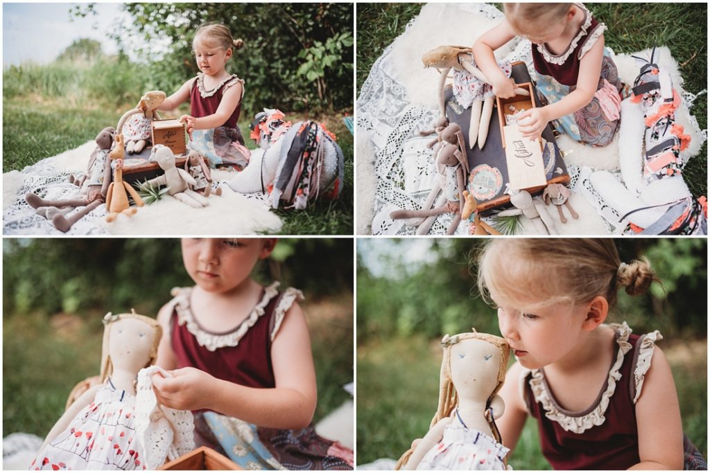 Ella playing with her favorite doll named Tutu. Photo by Laura Mares, a Pittsburgh Child Photographer.