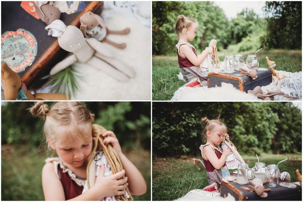 Ella playing with her favorite doll named Tutu. Photo by Laura Mares, a Pittsburgh Child Photographer.