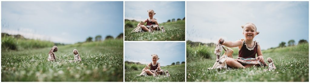 Ella playing with her favorite doll named Tutu. Photo by Laura Mares, a Pittsburgh Child Photographer.