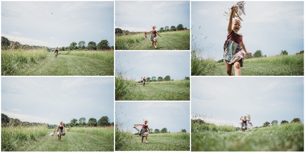 Ella running in a field with her favorite doll named Tutu. Photo by Laura Mares, a Pittsburgh Child Photographer.