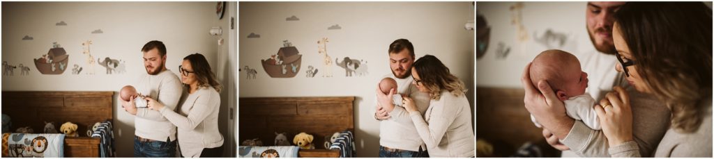 pittsburgh lifestyle portraits of a family of three standing in their newborn son's noah's ark themed nursery.
