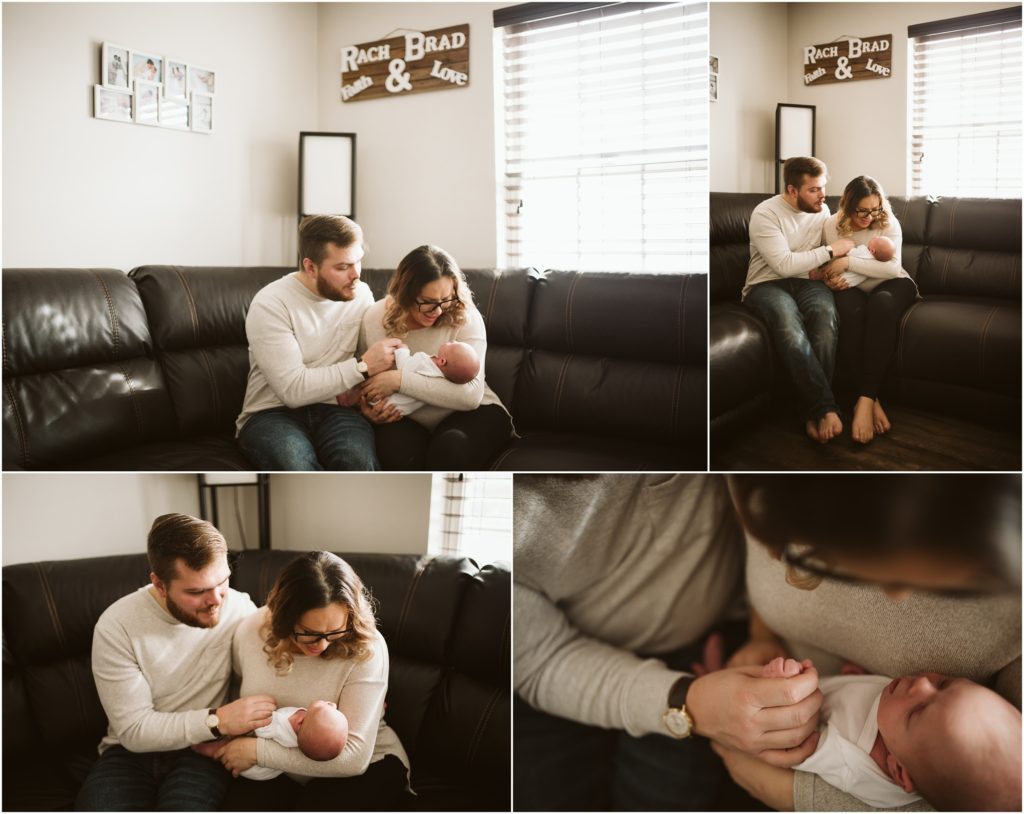 pittsburgh lifestyle portraits of a family sitting in their living room holding their newborn