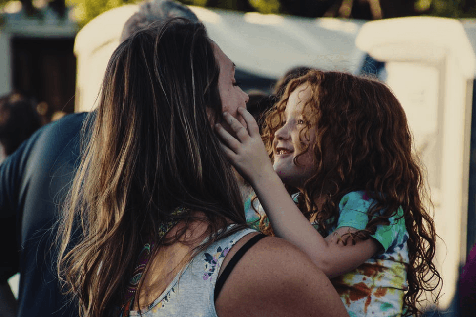 mother and daughter playing together