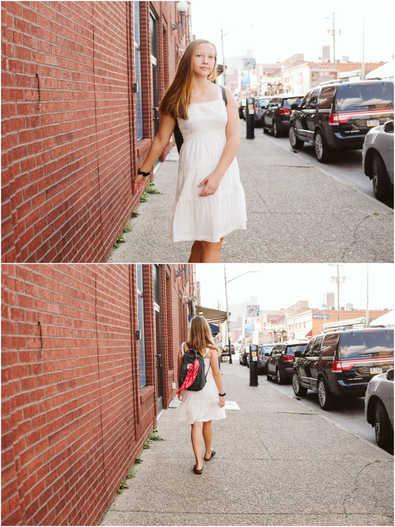 Girl walking in the strip district. Photo by Laura Mares Photography, Pittsburgh Senior Photographer.