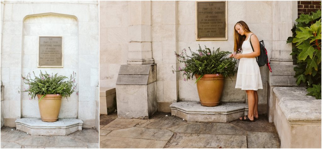 Girl looking at flowers. Photo by Laura Mares Photography, Pittsburgh Senior Photographer.