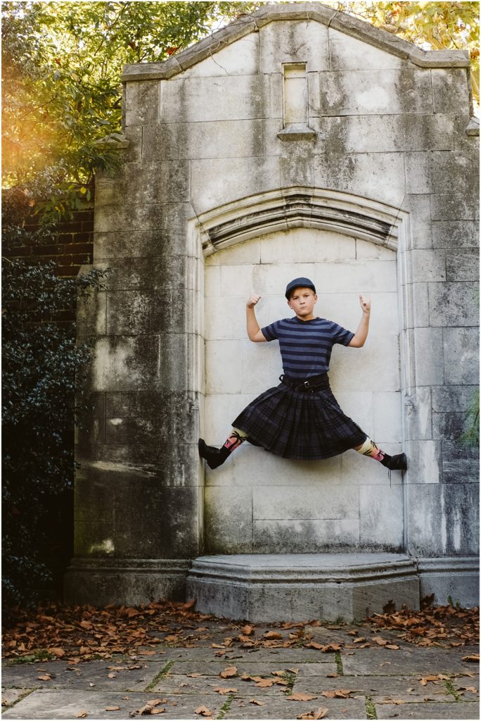 Boy climbing a unique wall in Mellon Park. Photo by Laura Mares Photography, Pittsburgh Lifestyle Photographer.