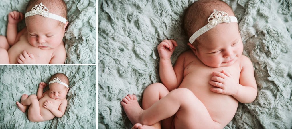 Newborn baby girl posed on a green furry blanket wearing a princess tiara. Newborn portrait by Laura Mares Photographer, Pittsburgh Newborn Photographer.