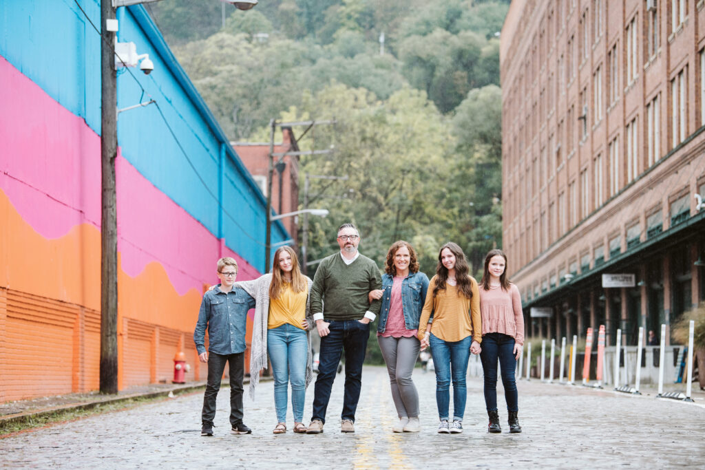 family in standing in Pittsburgh's south side