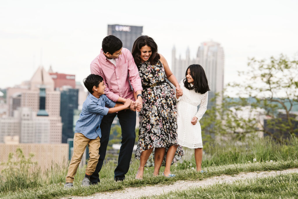 candid portrait of family having fun on Mt. Washington, Pittsburgh