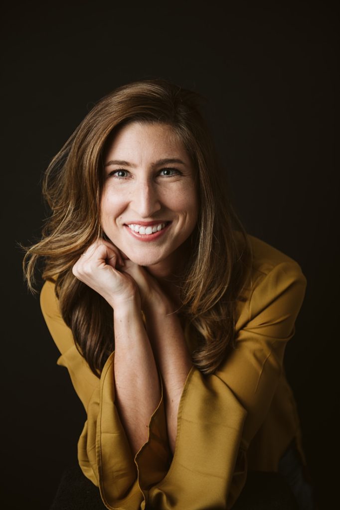 A portrait of a women sitting in the studio, Pittsburgh. Portrait by Laura Mares Photography, Pittsburgh Portrait Photographer