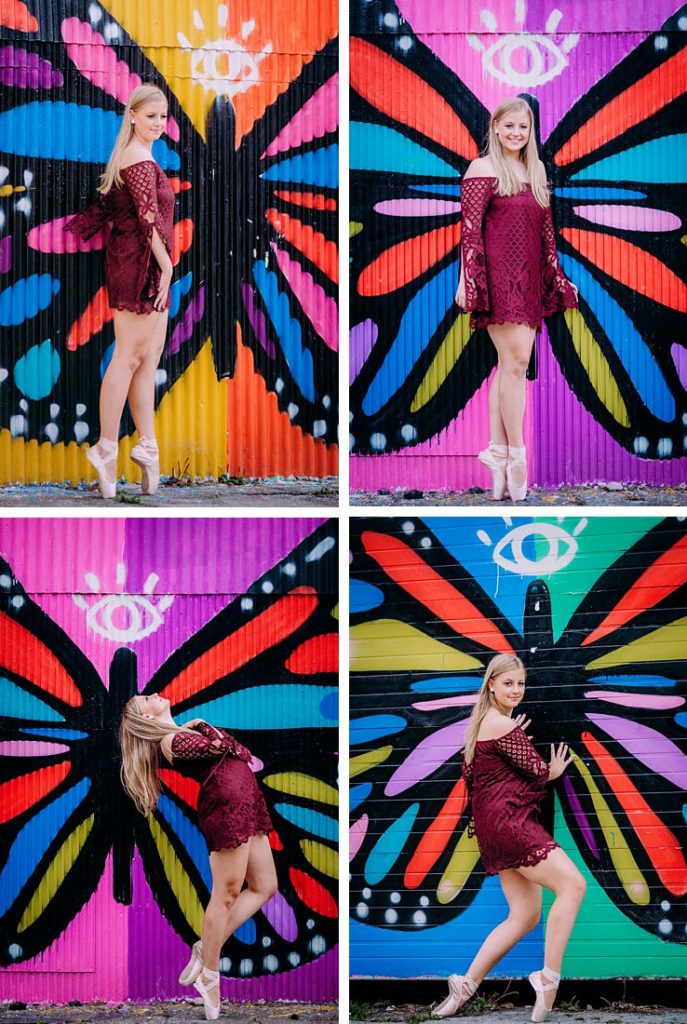 Senior portraits of a beautiful girl standing in her pointe ballet shoes in front of street art. Portraits by Laura Mares Photography, Pittsburgh Senior Photographer.