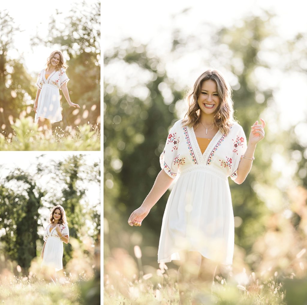 Portraits of a high school senior girl laughing on a rustic field at sunset. Photos by Laura Mares Photography, Pittsburgh Senior Photographer.