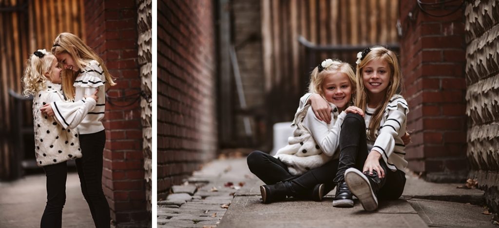 Urban family portraits taken in a brick alley. Portraits taken by Laura Mares Photography, Pittsburgh Family Photographer.