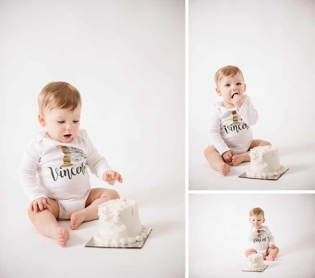 1st Birthday boy eating cake during his cake smash session. Photo by Laura Mares Photography, Pittsburgh Baby Photographer.