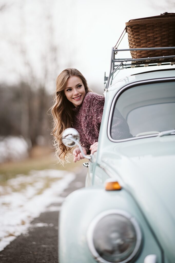 Senior girl posing for senior portrait with a VW Bug. Photo by Laura Mares Photography, Pittsburgh Senior Portrait Photographer.