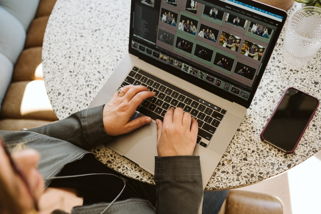 personal branding portrait of a woman working on her laptop