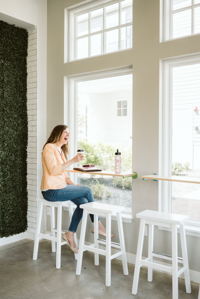 personal branding portrait of a health coach working in a juice cafe