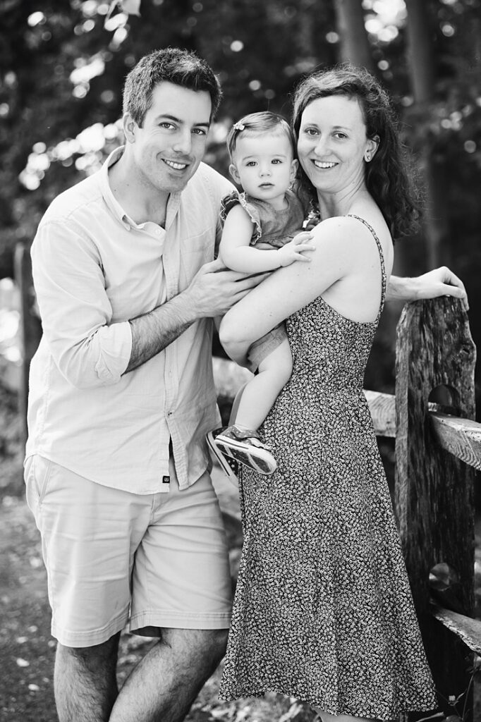 Portrait of family standing in Frick Park