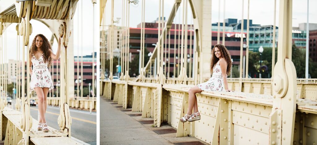 High school senior girl on the Roberto Clemente Bridge in Pittsburgh, PA during sunset