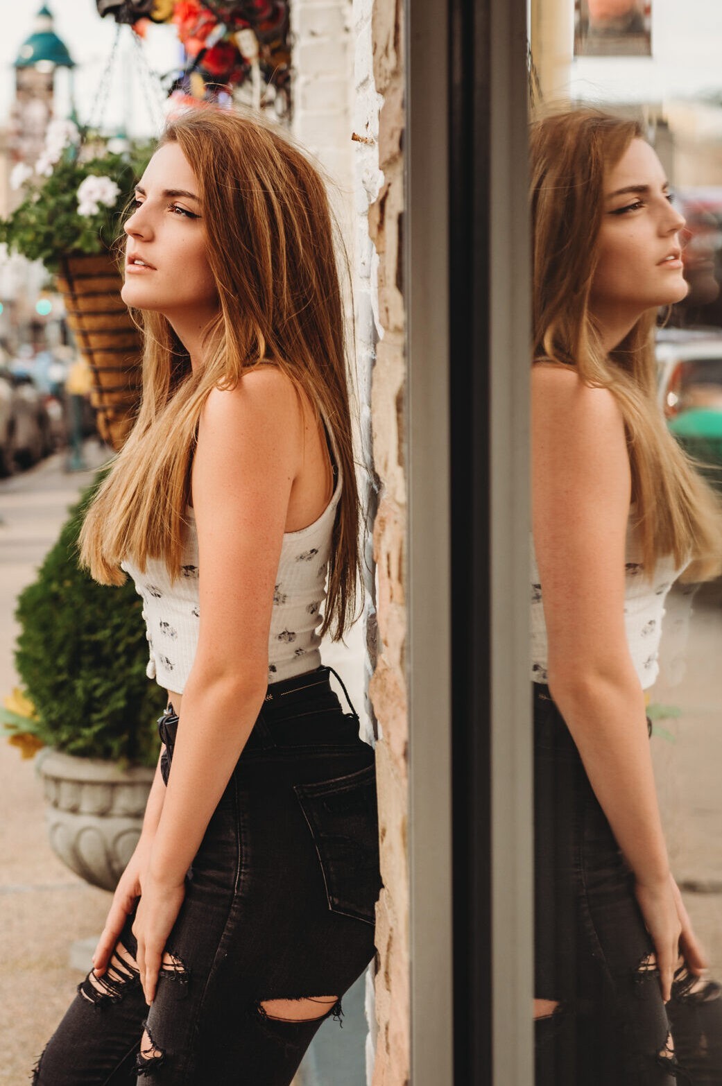 Photo of a high school senior girl standing in Uptown, Mt. Lebanon. Photo by Laura Mares Photography, Pittsburgh Senior Photographer.