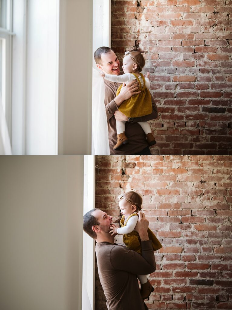 first birthday portrait of baby girl with her dad