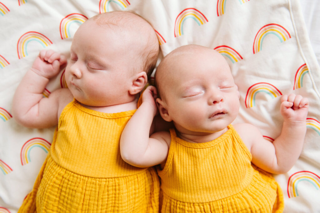 natural newborn twins portrait in modern white studio