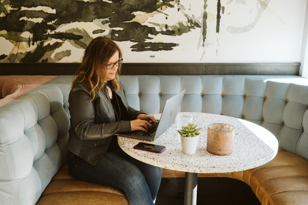 personal branding portrait of photographer working in a restaurant