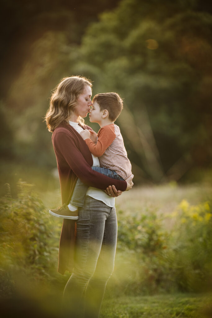 portrait of mother and son in a rural field at sunset near Pittsburgh, PA