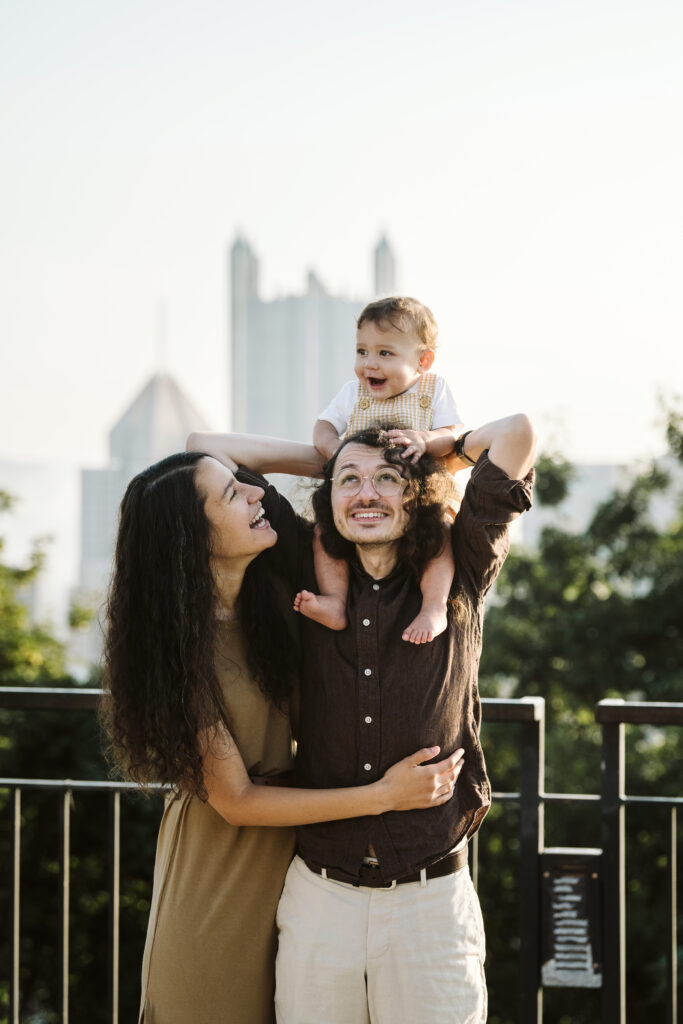 black and white portrait of family having fun on Mt. Washington