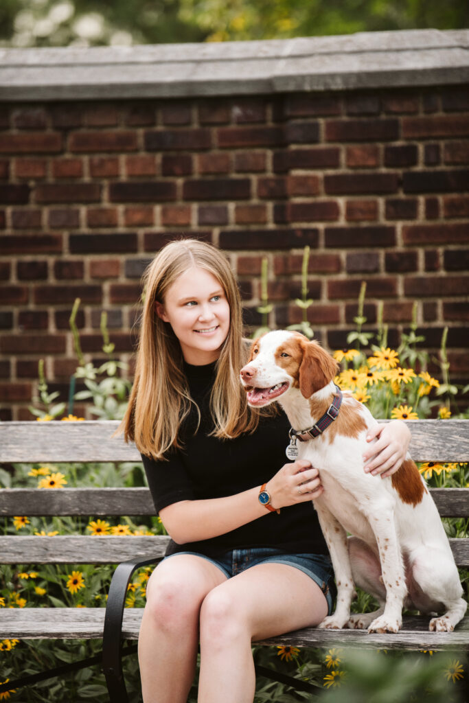 high school senior portrait of girl with dog in Pittsburgh, Mellon Park