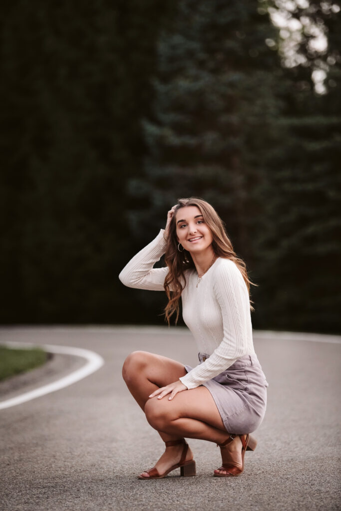 senior girl on curved street, Pittsburgh