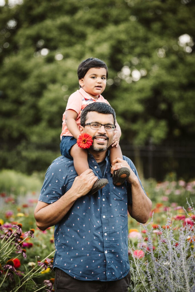 father and son in a flower field near Pittsburgh