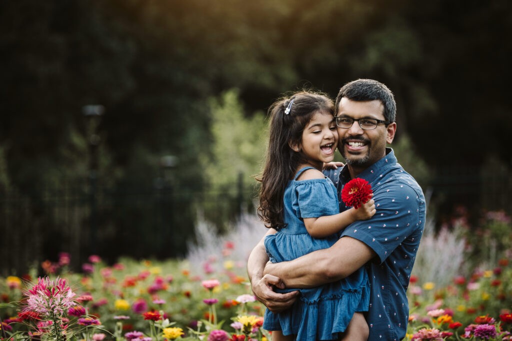 father and daughter in a flower field near Pittsburgh
