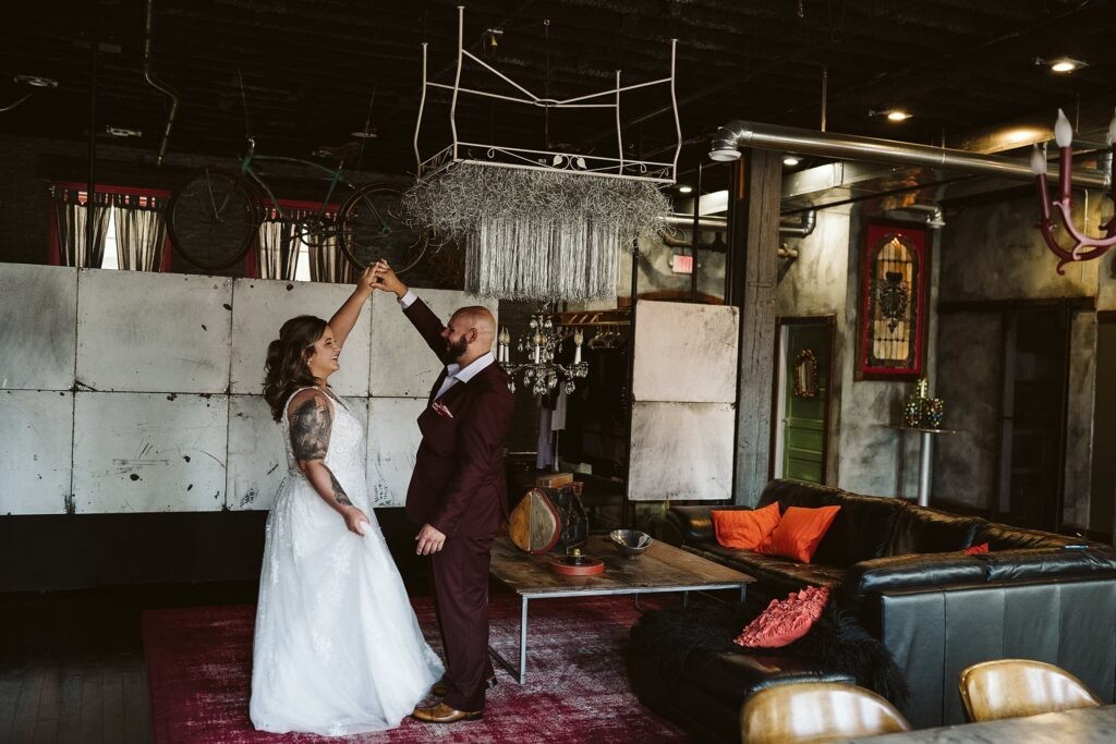 wedding couple dancing before their elopement