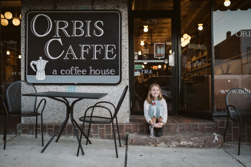 personal branding photo shoot for young artist in coffee shop