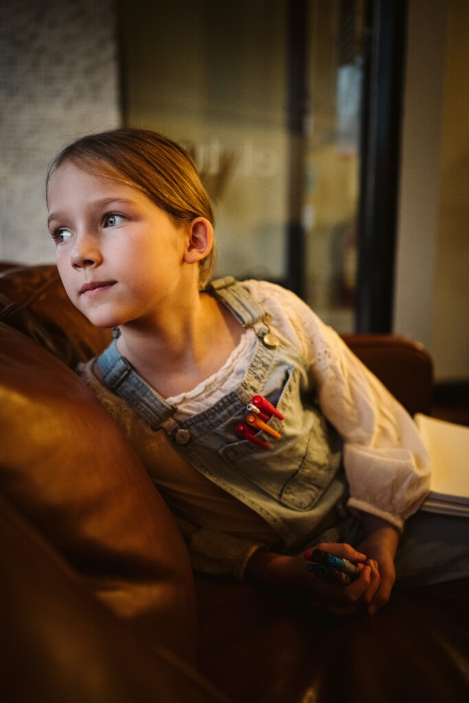 personal branding photo shoot for young artist in coffee shop