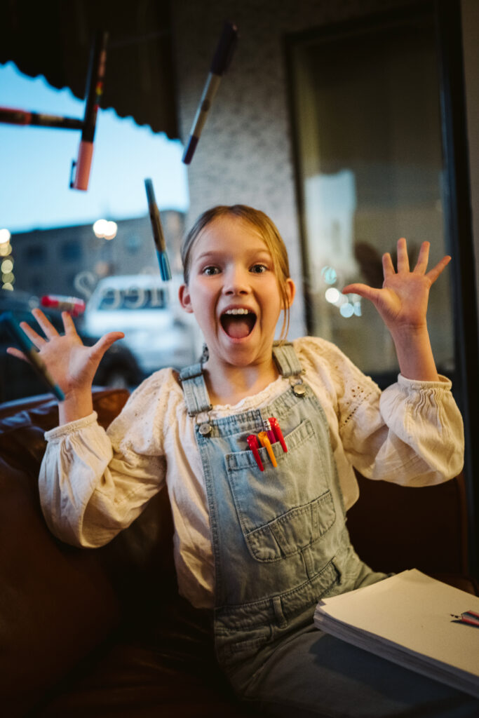 personal branding photo shoot for young artist in coffee shop