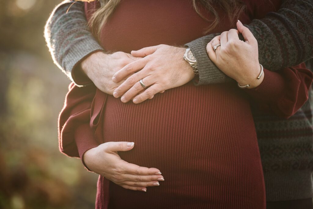 detail shot from maternity couple portrait in Pittsburgh's Mellon Park