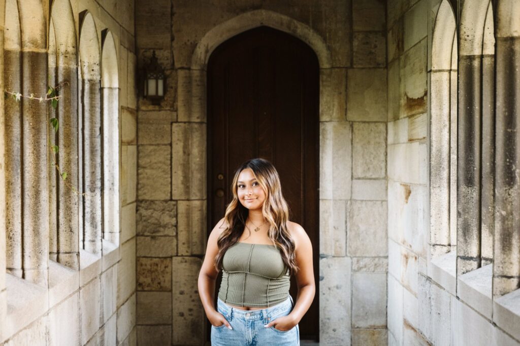 senior girl picture with architecture at sunset