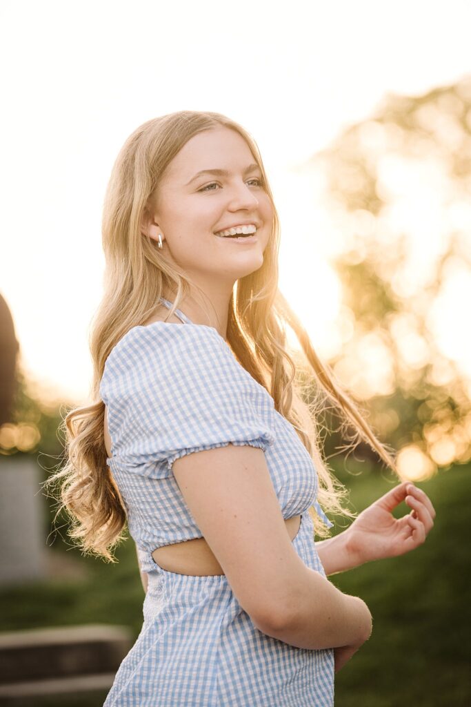 portrait of senior in Mellon Park at sunset