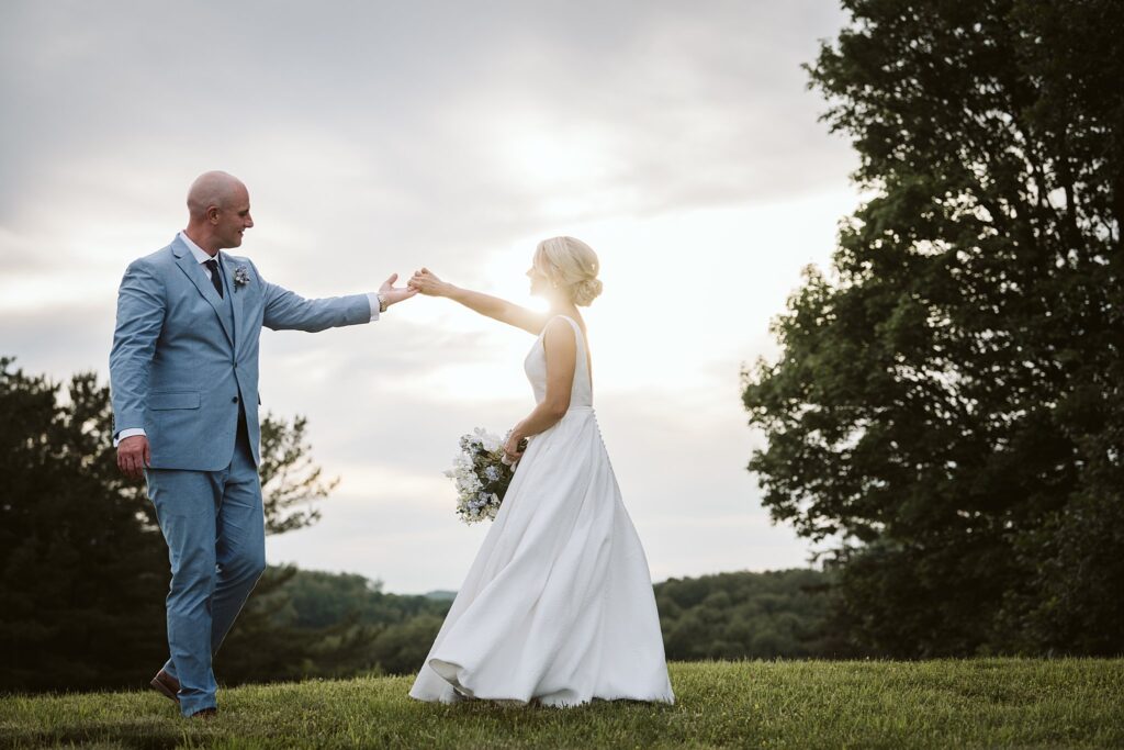 wedding couple dancing at sunset at The Grayson House