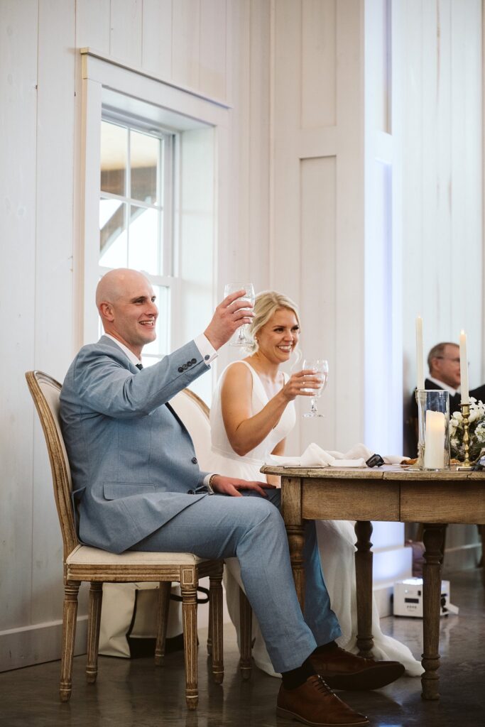 bride and groom at sweetheart table at Grayson House