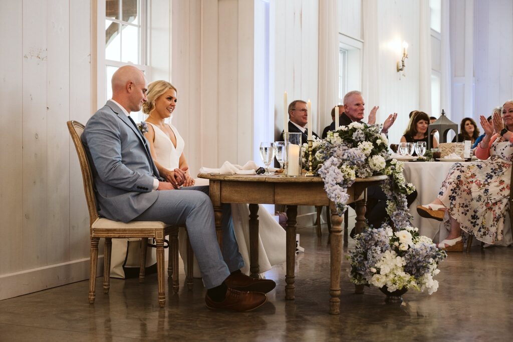 bride and groom at sweetheart table at Grayson House