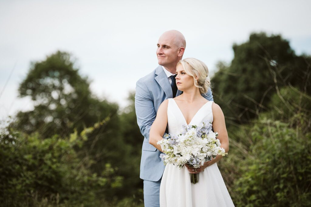 bride and groom near a forest