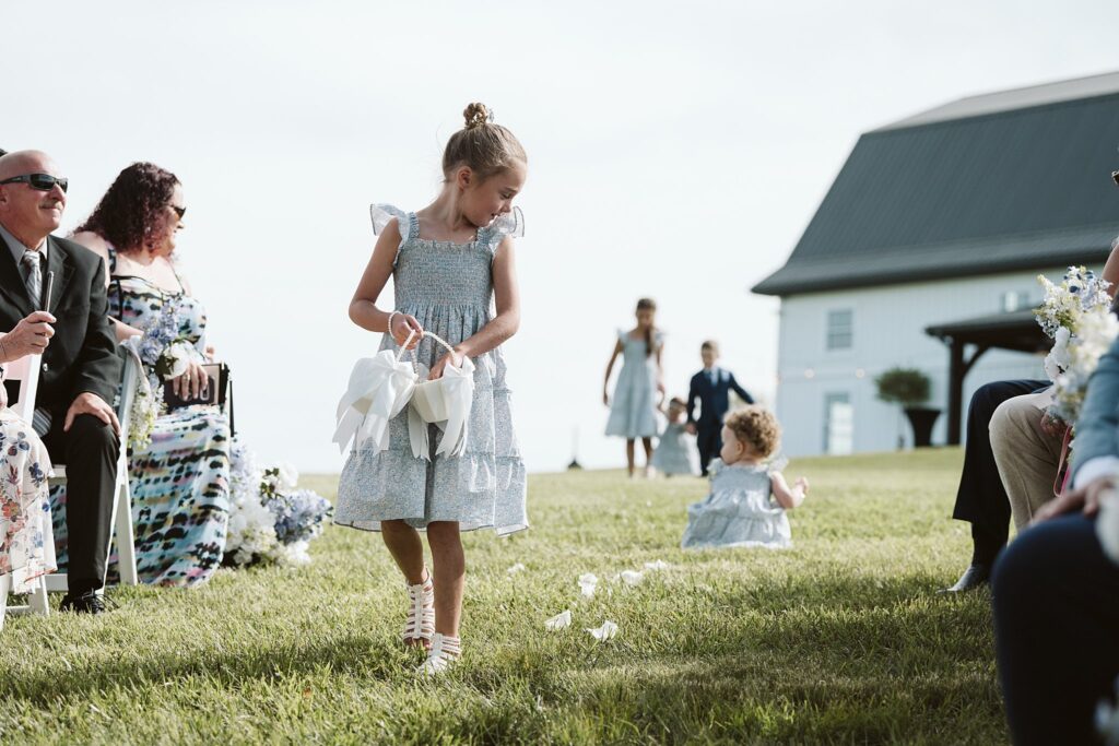 flower girls enter wedding ceremony at The Grayson House